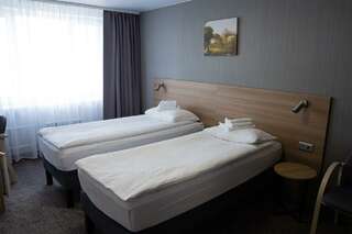 Гостиница Амакс Полярная Звезда Новый Уренгой Номер эконом с 2 односпальными кроватями-1